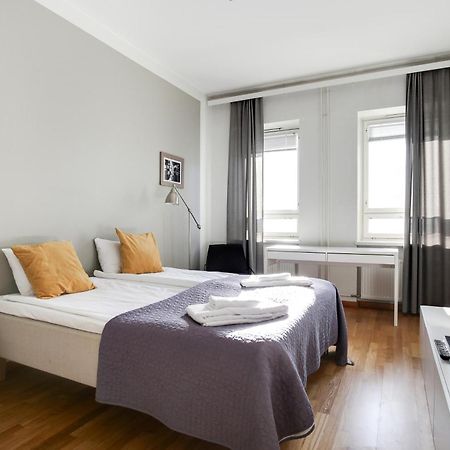 Kotimaailma Apartments Kamppi - 2Br In The City Center With Code Lock Helsínquia Exterior foto